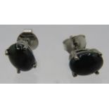 A pair of 925 stamped Cabochon Ethiopian black opal stud earrings 1.3 grams. Condition report: