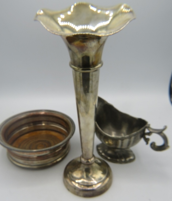 A tall silver fluted vase. Birmingham 1904. Approx: 11" high, weighted. A plated sauce boat and a
