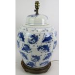 A large contemporary Chinese style blue and white porcelain covered jar lamp with Koi Carp