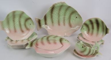 A mid century set of fish plates, dishes, tureen and sauce boat by Shorter & Sons, ten plates, one