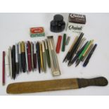 A collection of vintage ballpoint pens, quill dip pens and accessories including an 1889 Eastern