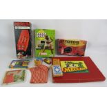 A mixed lot of vintage games, including Bjorn Borg tennis, Merlin, Jet fighters, Meccano, Belisha