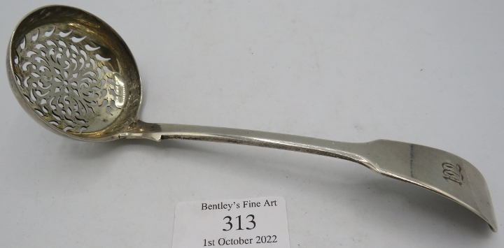 A Georgian silver sifter spoon, London 1836, maker WE, monogrammed. Approx weight 2 troy oz/65