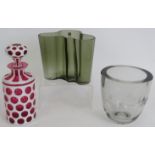 A contemporary smoked glass wavy vase by Alvar Aalto, signed, an engraved fish vase and a pink and