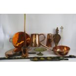 A quantity of mainly antique copper and brassware including jugs, pans, post horn, bellows, horse