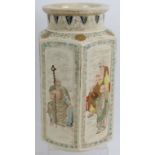 A Japanese pottery hexagonal Satsuma vase, Meiji period, hand decorated with scholarly scenes.