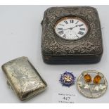A silver embossed fronted pocket watch case with pocket watch. Birmingham 1905. Also a silver