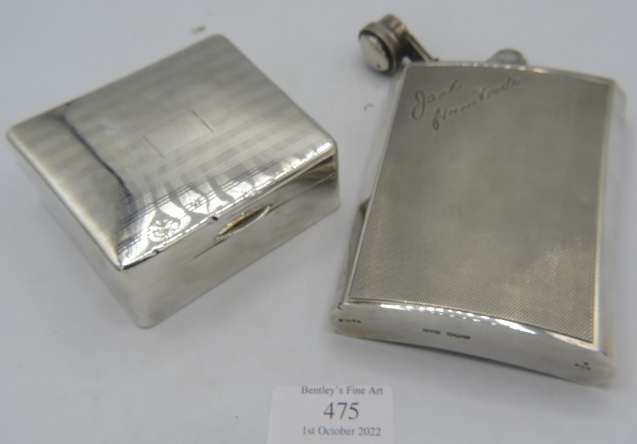 A silver hip flask with engine turned decoration engraved 'Jack from Dods' on the front. Sheffield