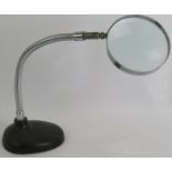 A Hilkinson chrome swan neck desk magnifier with black cast iron base. Condition report: No issues.