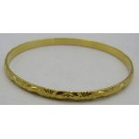 A yellow metal bangle. Hand made. marked 916, 20.2 grams. Insurance valuation in office £690,