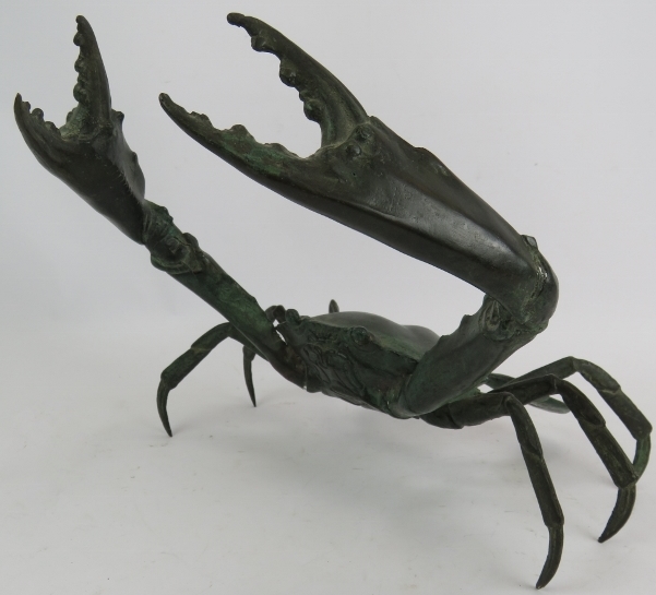 A large Japanese bronze model of a crab with claws raised. Height 26cm. Width 30cm. Condition