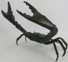 A large Japanese bronze model of a crab with claws raised. Height 26cm. Width 30cm. Condition