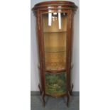 A vintage French Louis XV style ormolu mounted demi lune vitrine in the manner of Vernis Martin, the