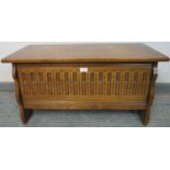 A vintage medium oak coffer/blanket box in a 17th century taste, featuring carved arcaded front,