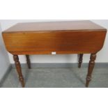 A late Victorian walnut Pembroke table, with drawer to either end, on turned supports. Condition