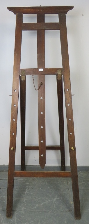 A vintage oak folding artist’s easel with height adjustable pegs. Condition report: Minor marks