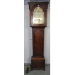 A Georgian oak cased 8-day striking longcase clock by W. Lee of Northampton, the hood with plain