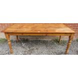 An antique pine rectangular pantry table, on turned supports. Condition report: Various marks and
