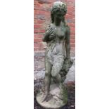 A nicely weathered reconstituted stone garden statue in the form of a classical maiden. Condition