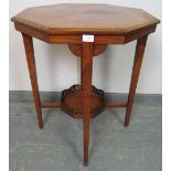 An Edwardian walnut octagonal occasional table, inlaid and strung with satinwood, on tapering square