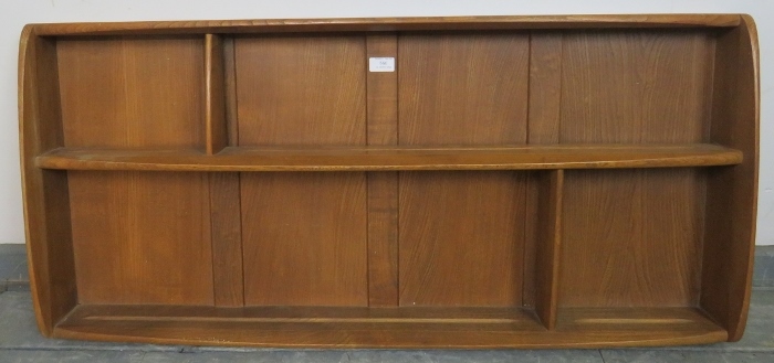 A mid-century blond elm wall hanging Windsor plate rack by Ercol, of two shelves. Condition