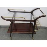 A mid-century mahogany Italian drinks trolley/bar cart in the manner of Ico Parisi, with brass