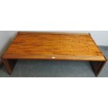 A mid-century hardwood Brutalist coffee table by Percival Lafer (Brazilian, b. 1936) with loose