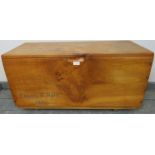 A bespoke elm coffer/blanket box in the manner of Ercol, raised on castors. Condition report: No