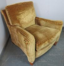 A large bespoke scroll-back armchair by Duresta, upholstered in gold and green striped crushed