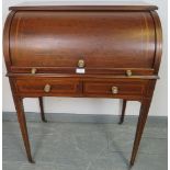 An Edwardian mahogany Regency Revival cylinder top writing desk, featuring crossbanded inlay and