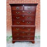 A fine George III mahogany secretaire chest on chest, the top housing two short over three long
