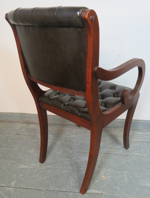 A reproduction mahogany desk chair in the Regency taste, upholstered in chocolate brown buttoned - Bild 3 aus 3
