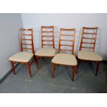 A set of four mid-century Danish ‘Lis’ teak dining chairs by Niels Koefoeds for Koefoeds Hornslet,