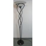 A contemporary Italian floor-standing wrought metal lamp with white glass shade in the manner of