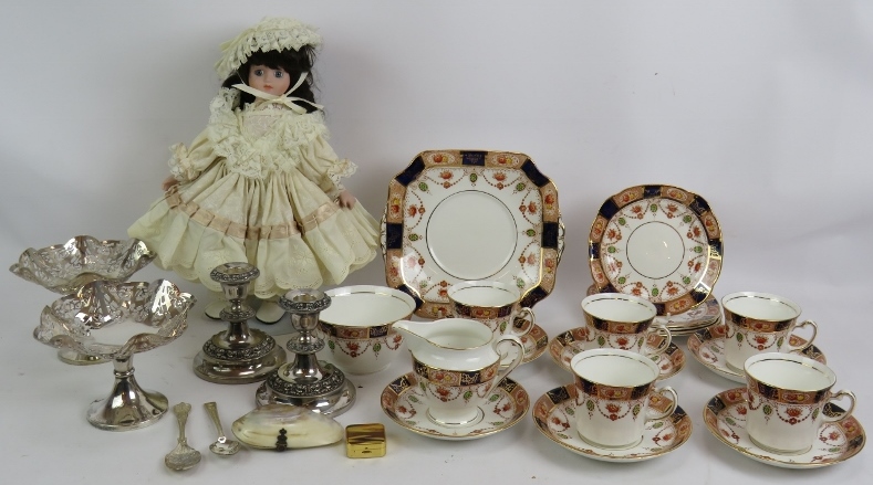 A Colclough China part tea set, a pair of silver plated candlesticks, pair of plated bon bon dishes,