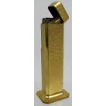 A vintage gold plated Dunhill Tallboy table lighter. Height: 11cm. Condition report: Some wear to