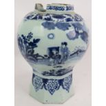 A 17th/18th century Delft vase, painted in the Chinese taste with figurative garden landscapes.