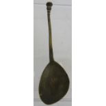 A post Medieval cast brass latten spoon with seal top terminal and possible maker's mark to bowl.