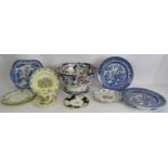 A large footed ironstone bowl, two Willow pattern heated plates, a similar dish, a Royal Doulton