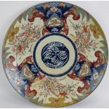 A large 19th century Japanese porcelain 'Imari charger decorated with bird in tree border. Diameter: