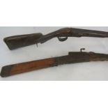A 19th century muzzle loading double barrelled shotgun, obsolete, and an Eastern Jezail, possibly