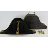 A 19th century British naval officer's bicorn hat with Toleware tin. The hat bears a Queen's crown