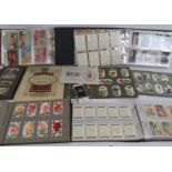 A collection of cigarette cards in nine albums including Gallaher's, Will's, Senior Service,