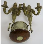 A pair of cast brass twin candle wall sconces and an oak and silver plate aesthetic movement biscuit