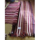 Two 20's Nomadic style tent floor coverings, red, brown, cream, black and yellow stripe. 250cm x