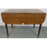 An early Victorian mahogany Pembroke table, with reeded edge, single drawer and dummy drawer on