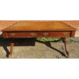A large 19th century mahogany partners desk, with inset gilt tooled tan leather writing surface,