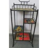 An antique Japanese ebonised bamboo etagere, of four shelves, on splayed supports. Condition report: