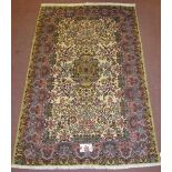 A central Persian Kerman rug, very soft pastel colours, floral pattern and in good condition 184 x