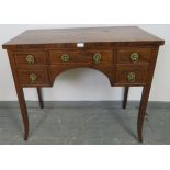 A Regency mahogany sideboard of small proportions, with one long and four short drawers strung